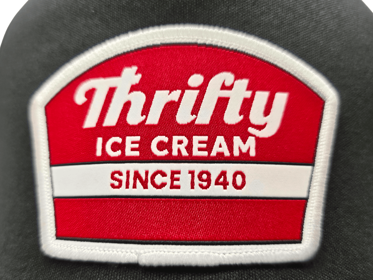Thrifty Black Logo Trucker Hat