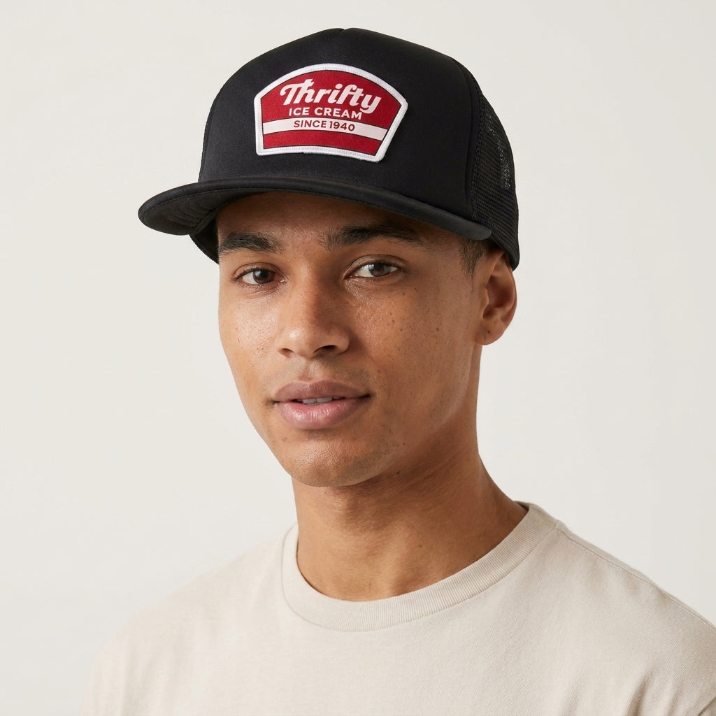 Thrifty Black Logo Trucker Hat