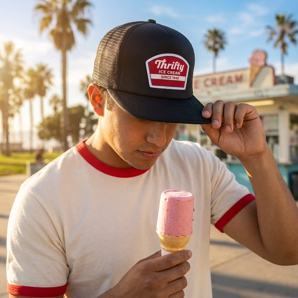 Thrifty Black Logo Trucker Hat